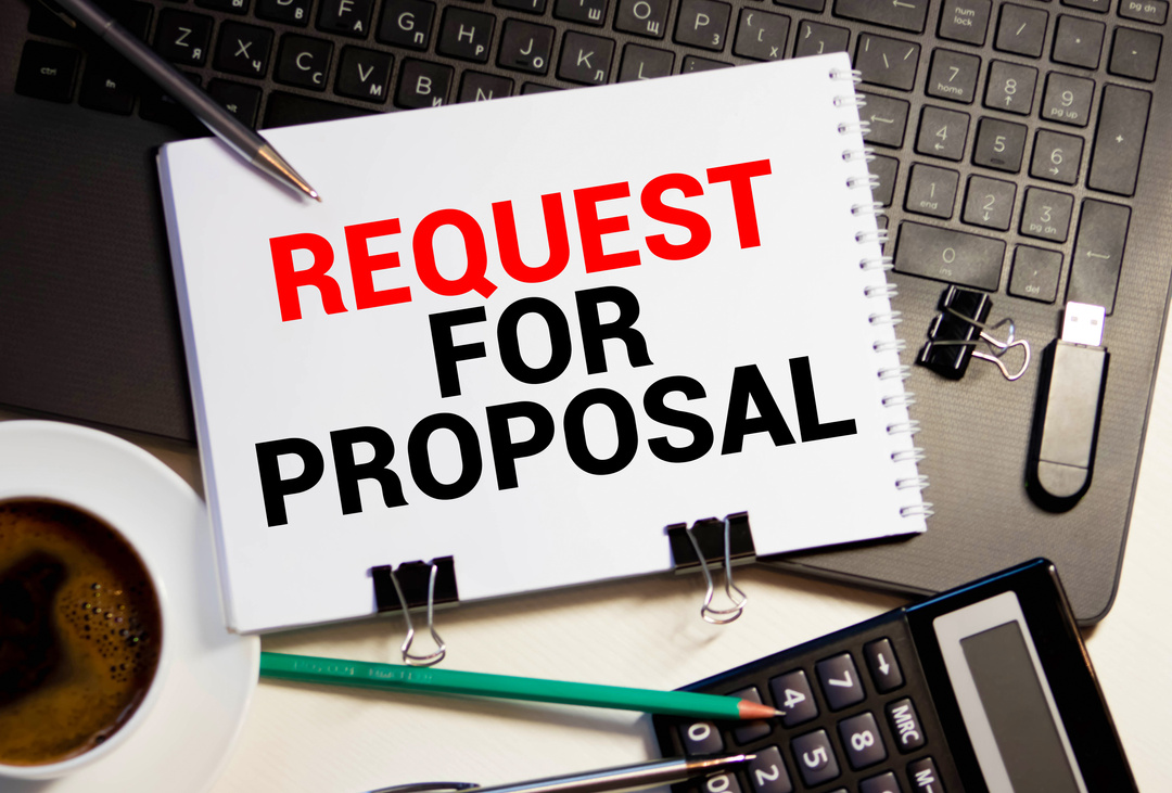 Request for proposal text on brown envelope